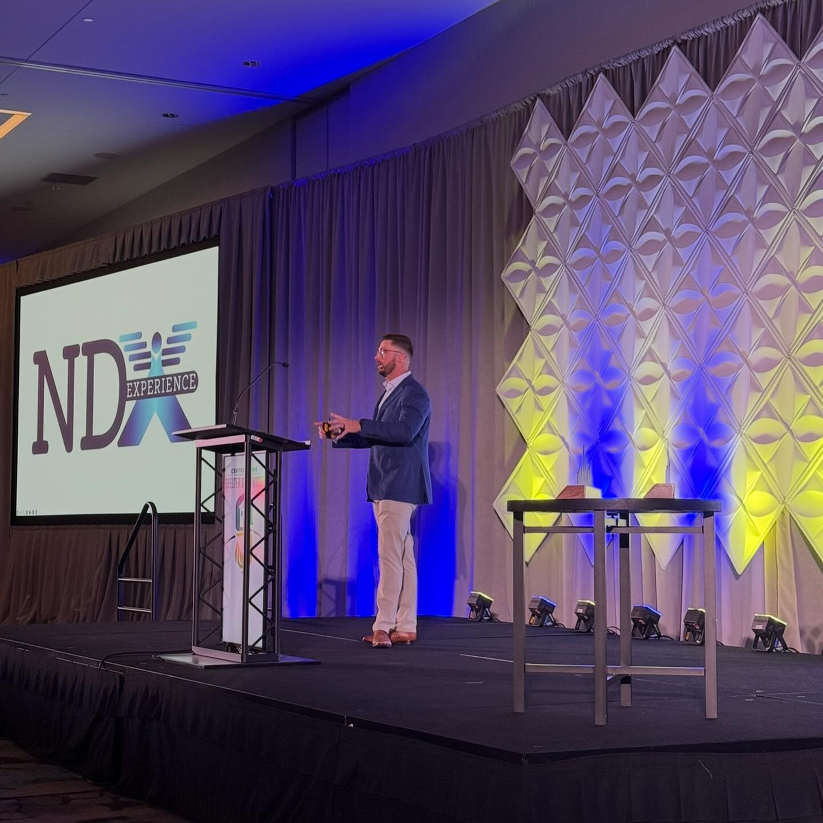 Nick Darland speaking on stage